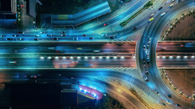 Expressway, Self-driving autonomous electric cars of the future with elements move along a busy traffic intersection. Artificial Intelligence, Car Scan, GPS Tracking, Smart Roads, IoT, highway
