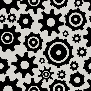 Title: A pattern of interlocking black and white gears of various sizes arranged in a seamless