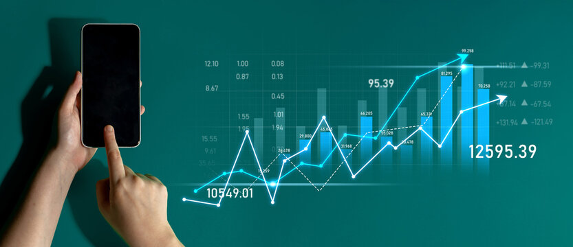A businessman interacts with a smartphone displaying financial data and trends, representing modern analytics and investment strategies in a digital landscape. Scalp - Powered by Adobe
