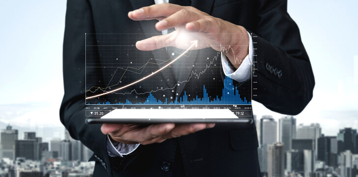 A businessman interacts with a tablet showcasing financial data and a growth graph, set against a vibrant city skyline. Ideal for finance and technology themes. Scalp - Powered by Adobe