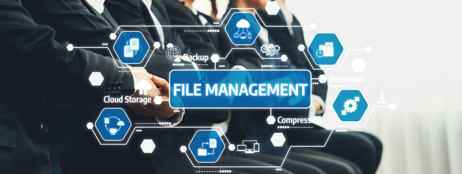 A visual representation of file management concepts highlighted on a digital dashboard with business professionals engaged in a formal setting, showcasing teamwork and technology. Amity - Powered by Adobe