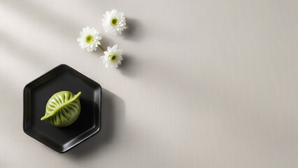 Minimal Qingming festival background with neutral copyspace background and green dumpling plate. Calm spring design background offering space for text