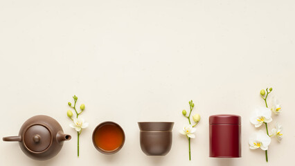 Modern linear tea set featuring Qingming festival background with red caddy and orchids, clean spring design with copy space