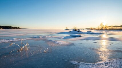 Frozen lake at sunrise landscape scene.