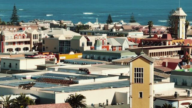 Stunning aerial drone video of Walvis Bay, Namibia, where vast desert dunes meet the Atlantic Ocean.