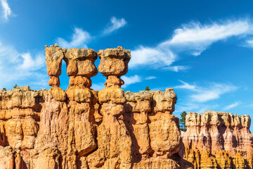 Three Hoodoos rock formation on Navajo Trail loop, in Bryce Canyon National Park, Utah, which is the home of the largest hoodoo concentration on earth.