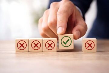 Businessman carefully selecting the correct choice symbolized by a green checkmark cube among several incorrect red crosses during evaluation