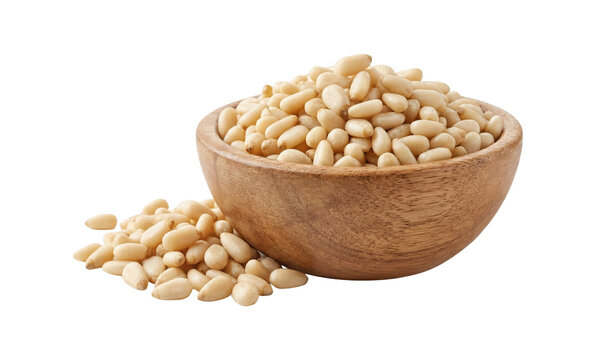 Small wooden bowl filled with delicious healthy pine nuts ingredient used in cooking and baking isolated on transparent background