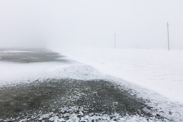 Beautiful winter landscape with frosty nature in the Republic of Moldova, Europe. Authentic rural winter countryside.

