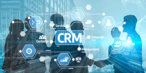 This image showcases an abstract digital interface for CRM, highlighting business professionals in silhouette while they engage in strategic discussions and collaborations. Tessel