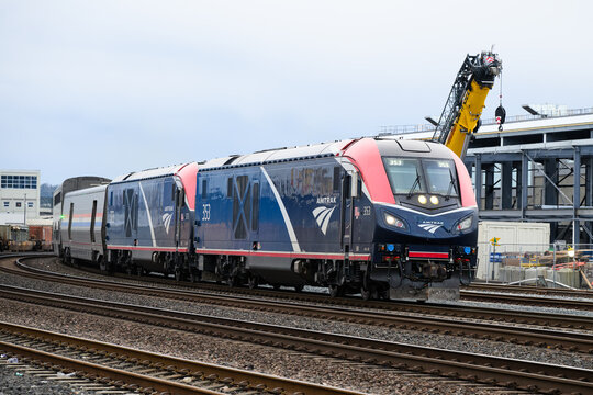 Seattle - January 3, 2026; Pair of Amtrak ALC-42 diesel locomotives lead Empire Builder train into Seattle