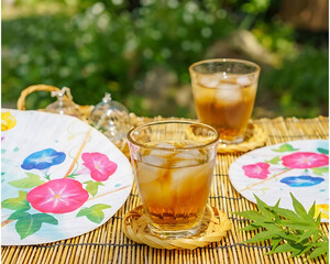 Refreshing Iced Japanese Tea with Ice on Bamboo Mat, Summer Drink Concept 