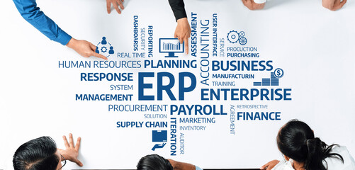 This image shows a diverse group of professionals engaging in a strategy session about ERP implementation. They analyze business solutions and management processes collaboratively. Amity