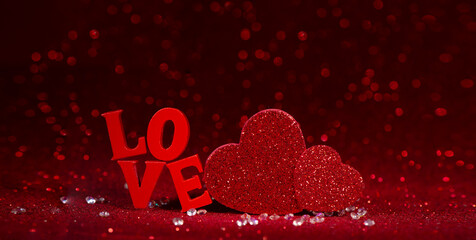 Red Love Hearts and Love Letter Decoration on Glitter Background. The Valentines Day concept perfect for holiday designs, greeting cards, and advertising.