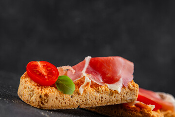 jamon bruschetta prosciutto appetizer portioned tapas dish natural tasty snack fresh delicious gourmet food background on the table rustic top view copy space
