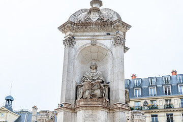 Fountain of Moliere in Paris, France Old architecture monument
