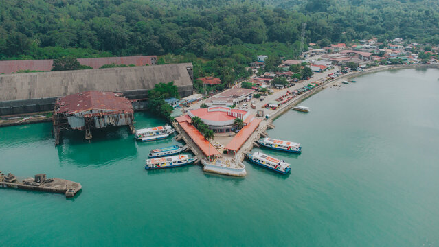 Harbor Haven: Aerial View of Coastal Pier Amid Emerald Waters of Jordan, Guimaras, Philippines