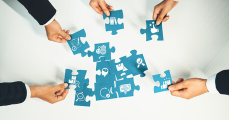 Top view panorama banner of business team assembling jigsaw puzzle over table symbolize business partnership and collective teamwork for HR recruitment and job seeker background. Shrewd Amity