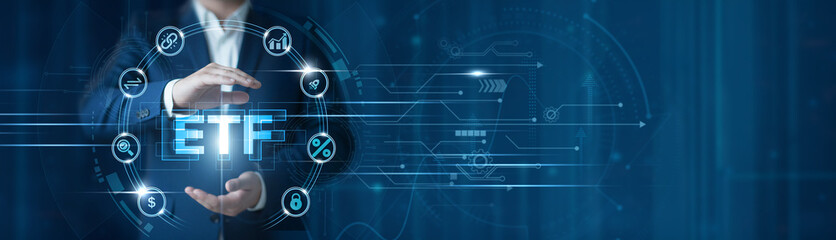 Businessman hand hold ETF, financial market data platform, portfolio management technology,...