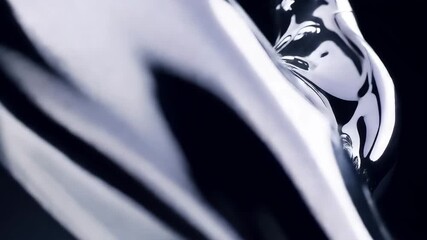 Mesmerizing liquid metal blobs morph and flow in abstract, dark, and reflective motion graphics, creating a fluid, dynamic visual experience.