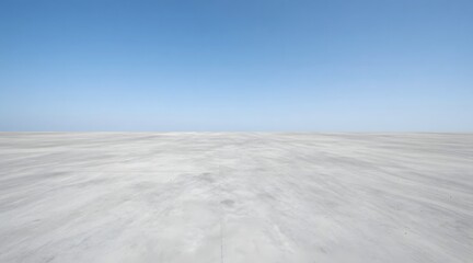 Empty concrete floor under a clear blue sky for product display and commercial use