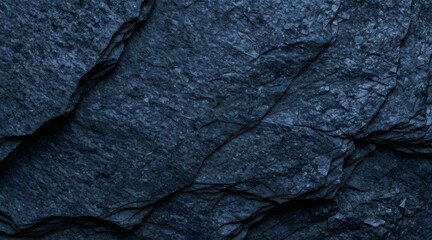 Dark blue rock texture with interesting shapes and details for backgrounds