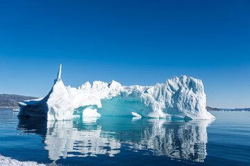 Giant Ice Formations Floating in Disko Bay, Greenland © Michel