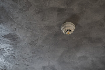 A view of a numbered ceiling fire detector.
