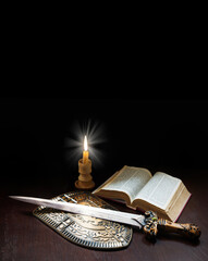 Book with sword and shield