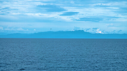 Obraz premium Exotic islands in the equatorial seas, Bali Sea, Gamalama stratovolcano island. Indonesia. Indian Ocean. Ternate, archipelago Moluccas, Spice Islands