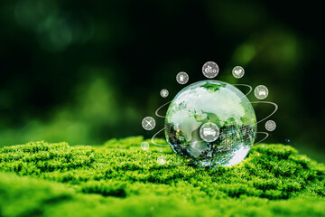 Crystal globe resting in a forest idea for global transport Net zero logistics, green energy,...