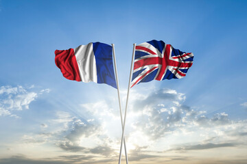 Waving National flag of France and flag of United Kingdom