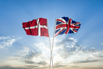Waving National flag of Denmark and flag of United Kingdom