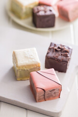 Sweet dessert cake. Mini pie on white table.