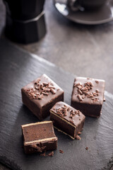 Sweet dessert cake. Mini pie on black table.