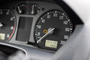 Dashboard warning signal, Instrument cluster displays alert symbol indicating issue