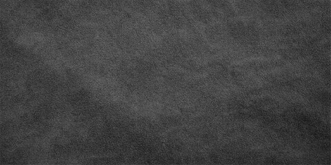Fototapeta premium A dark vintage backdrop featuring a rough black leather and fabric texture with a grunge pattern on a blank gray surface for a textured wallpaper design