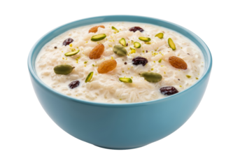 ramadan rice pudding in blue bowl with nuts and raisins