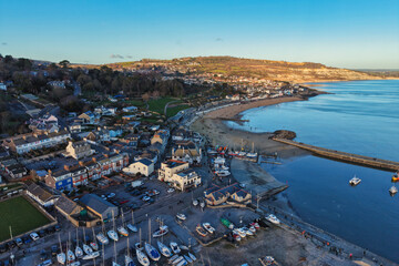 Aerial View of Lyme Regis Town and Harbour on a winter sunny day, Dorset, England