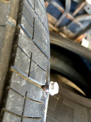 Flat Causes by Screw in Tire