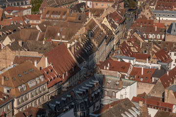 View from balcony of cathedral in Strasbourg, with buildings and sky in background