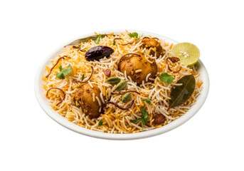 golden biryani rice with chicken pieces on plate