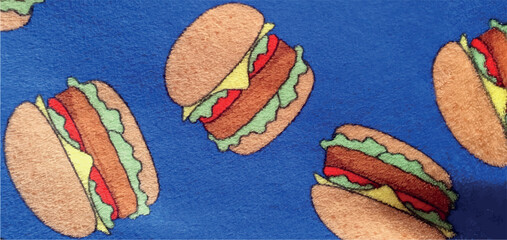 Blue fleece fabric texture with a burger print. Burger print on fabric. Cartoon burger texture background. © Nataly G