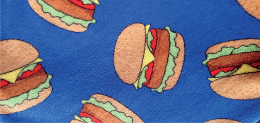 Blue fleece fabric texture with a burger print. Burger print on fabric. Cartoon burger texture background. © Nataly G