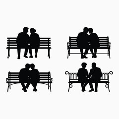 Silhouettes of couples on benches