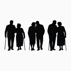 Silhouettes of elderly couples walking together