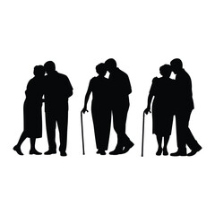 Silhouettes of elderly couples walking together