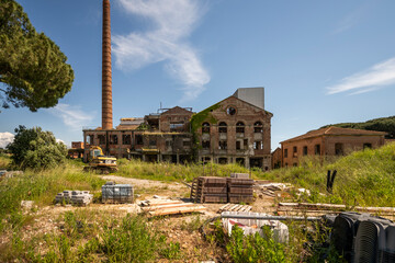 Abandoned sugar factory interior in Italy. Industrial urbex photography of derelict refinery ruins...