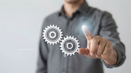 Man using transparent touch screen with gears and activating digital mechanism