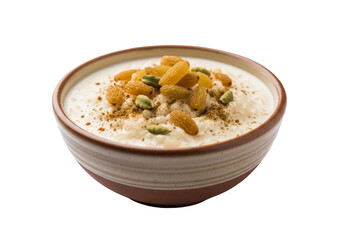creamy rice pudding with almond and pistachio topping in a bowl